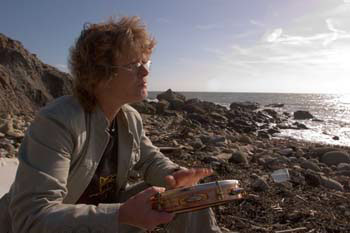Bev playing pandeiro at Watershoot Bay